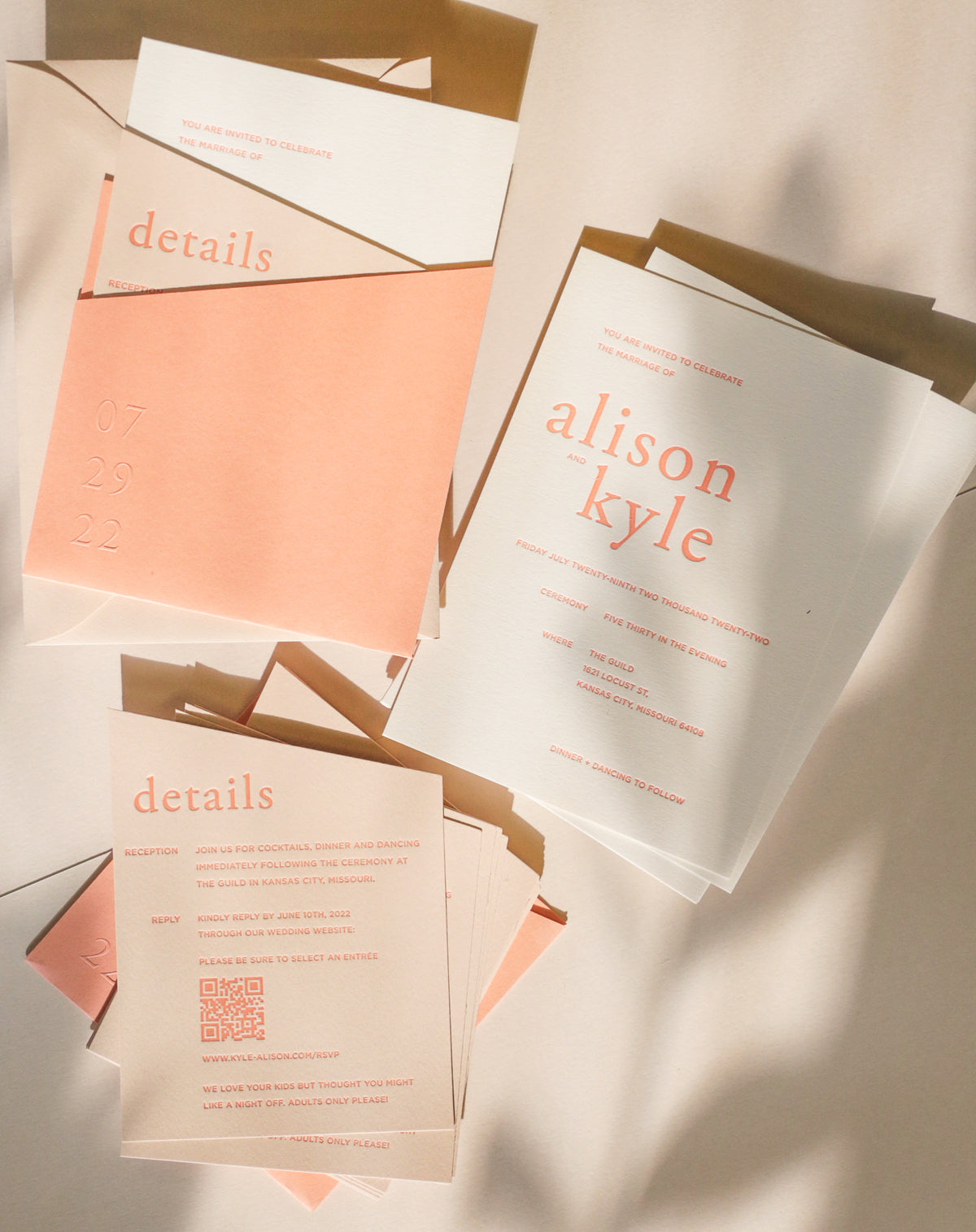 Letterpressed invitations in diecut pocketfold